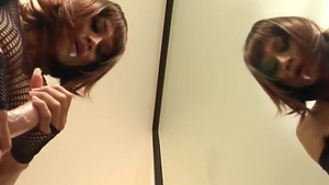 Redhead Ladyboy In black lingerie Sucks A fake penis By The Mirror